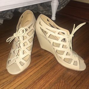 Mia cutout lace-up wedge heels.